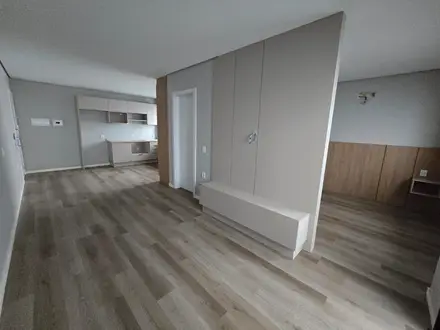 Living com painel planejado