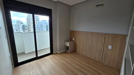 Dormitório com sacada